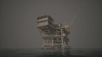 An oil rig in the vastness of the ocean video