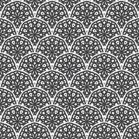 Vector seamless pattern with scales and ornament of mandala. Vector black and white seamless background. The Art Nouveau style. Best for fabric, wrapping paper and home decor