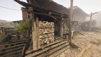 A rustic wooden building surrounded by stacked logs video