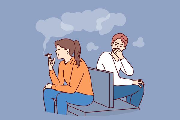 Woman smokes sitting in public place and causes inconvenience to man, making him passive smoker