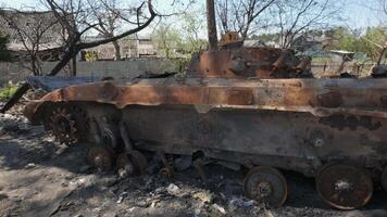 Burnt and destroyed armored personnel carrier of the Russian army as a result of the battle with the Ukrainian troops. Russian aggression in Ukraine. Ukraine is waging a liberation war with Russia. video