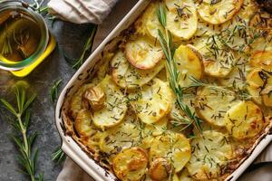 AI generated Potatoes baked with rosemary and thyme photo