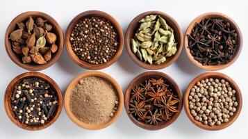 AI generated Variety of spices in wooden bowls on white photo