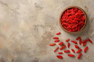 AI generated Dried goji berries in a wooden bowl photo