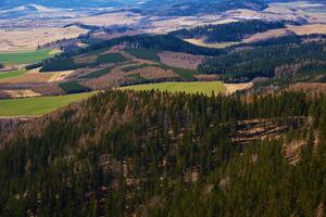 Natural landscape with mountain ranges and valleys photo