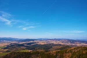 Natural landscape with mountain ranges and valleys photo