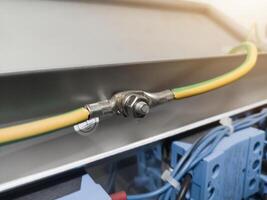 Cables Terminals grounding  of the Earthing point system on electrical  panel board. photo