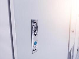 Close up the Modern panel door locks by pressing the push mark on the panel door will open. photo