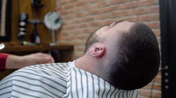 Beard care for young stylish men in a barbershop. Male beauty. Beauty salon for men video