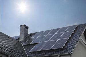 Rooftop Solar Panels on Residential Building photo