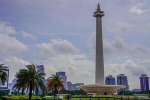 Central Jakarta, January 30, 2024 - beautiful view of the national monument with clear skies during the day. photo