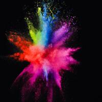 AI generated centered explosion of colorful powder on a black background photo