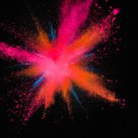 AI generated centered explosion of colorful powder on a black background photo