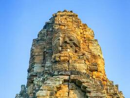 Bodhisattva Avalokiteshvara face on Bayon temple in Angkor, Cambodia photo