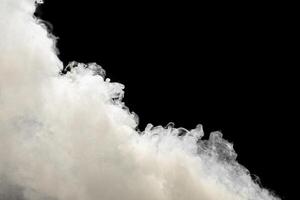 Smoke on a black background. Overlay. White clouds or fog. Graphic element photo