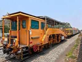 The ballast tamping machine is parking. photo