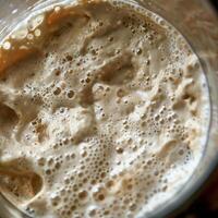 AI generated Active sourdough starter, close up photography. photo