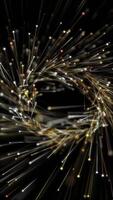 Vertical video - a spiraling helix of magical glowing golden line and sphere particles background animation. This abstract gold luxury motion background is full HD and a seamless loop.