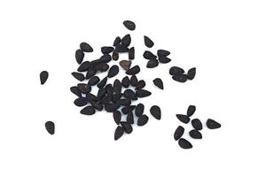 Black cumin seeds pile isolated on white background photo