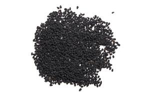 Black cumin seeds pile isolated on white background photo