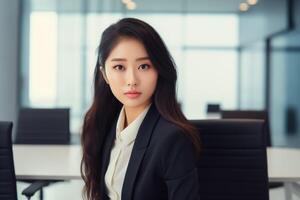 ai generado joven asiático negocio mujer en el moderno oficina. retrato de confidente empresario mujer a el lugar de trabajo, de cerca. foto