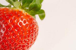 Strawberry on a white background. Macro. Selective focus. photo