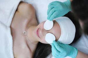 Woman Receiving Professional Spa Eye Treatment photo