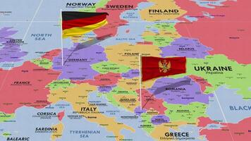 montenegro e Germania bandiera agitando con il mondo carta geografica, senza soluzione di continuità ciclo continuo nel vento, 3d interpretazione video