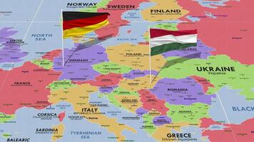 Hungary and Germany Flag Waving with The World Map, Seamless Loop in Wind, 3D Rendering video