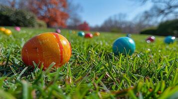 ai generado naranja y azul pelota en lozano verde campo foto