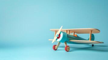 AI Generated Vintage toy airplane on blue background photo