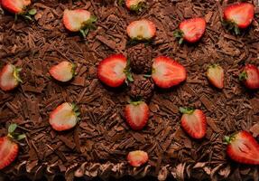 Chocolate And Strawberry Cake. Creamy sweet top view with fruits, typical Brazilian food photo