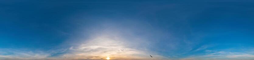 Blue sky with Cirrus clouds Seamless panorama in spherical equirectangular format. Complete zenith for use in 3D graphics, game and for composites in aerial drone 360 degree panoramas as a sky dome photo