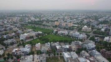 Main road crossing the residential area of Defence Housing Society Lahore Pakistan on July 22, 2023 video