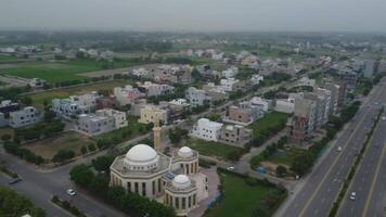 Main road crossing the residential area of Defence Housing Society Lahore Pakistan on July 22, 2023 video