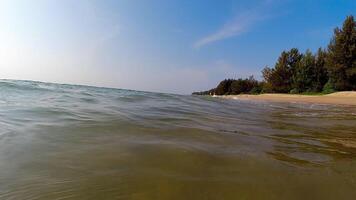 Azure sea. Light waves rolling onto the shore of the island video