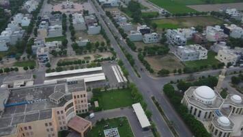 Main road crossing the residential area of Defence Housing Society Lahore Pakistan on July 22, 2023 video