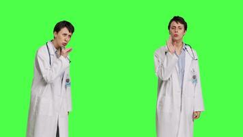 General practitioner showing hush symbol to be quiet and keep secrecy, putting finger over lips for privacy and silence expression. Medic doing mute symbol, asking to be quiet. Camera B. video