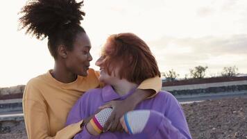 two women kissing in the sun video