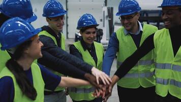 a group of people in hard hats and vests video