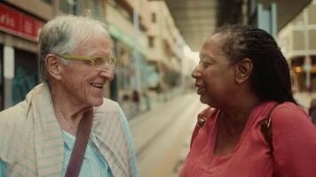 an older woman and an older man talking video