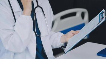 Doctor and patient discussing something while sitting at the table . Medicine and health care concept. Doctor and patient video