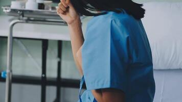 patient sat on the bed and looked out the window in the hospital alone and had stress, boredom, loneliness, anxiety video