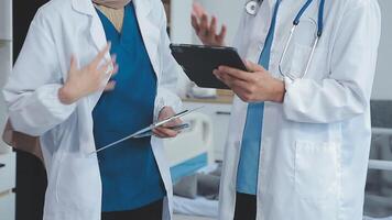 Doctor explaining report to patient in the hospital video