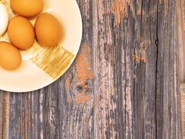 Eggs on wooden background video