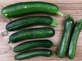 Courgettes on wooden background video