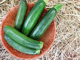 Courgettes on wooden background video