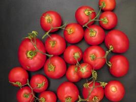 Tomatoes on wooden background video