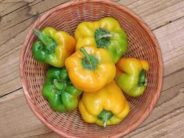 Peppers on wooden background video