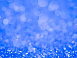 Blue sparkling bokeh background. photo